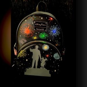 Disney 100 year anniversary light up loungefly backpack.